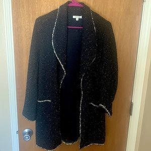 Lightweight black and white cardigan. Size medium. Brand new. No tags.